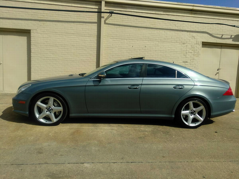 Illustration for article titled At $10,999, Could This High-Mileage 2006 Mercedes CLS 55 AMG Prove Four Is More?